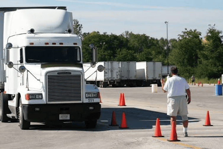 Fleet trucks lined up at a depot